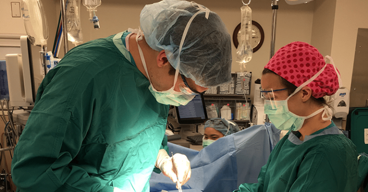doctors in scrubs treating bladder cancer