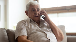 older man on phone