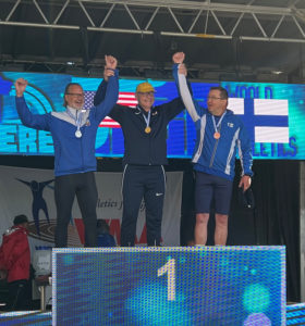 Picture of Scott winning a gold medal in Finland